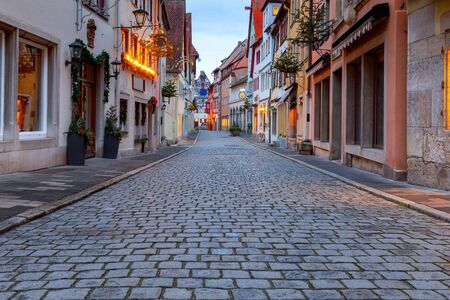 View of the stone towers and medieval buildings in the historic city. Rothenburg ob der Tauber. Bavaria Germany.の写真素材