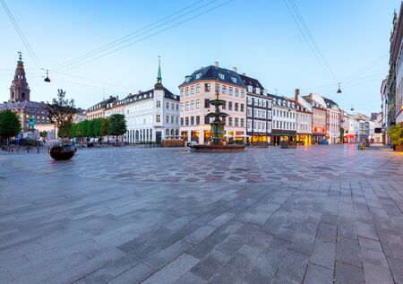 Square Amagertorv Stork fountain in night lighting at sunrise. Copenhagen. Denmark.の写真素材