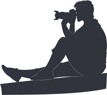 Silhouette of a woman photographer with a camera in her hands.のイラスト素材
