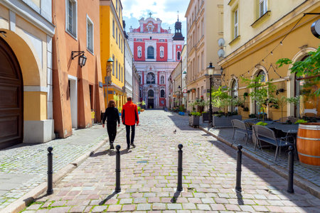 Poznan. Narrow old street with famous medieval houses.の写真素材