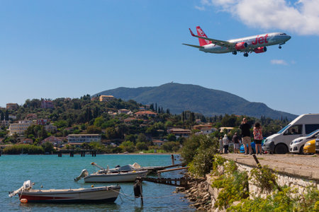 A Jet passenger plane lands at Corfu airport.のeditorial素材