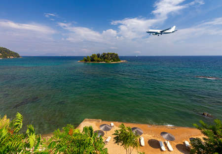 Mouse Island in the middle of a blue bay.の写真素材
