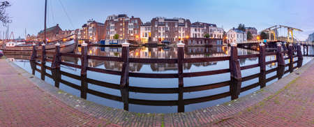 Panorama of the city embankment in Leiden at sunrise.の写真素材