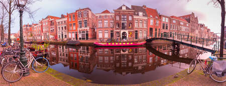 Panorama of the city embankment in Leiden at sunrise.の写真素材