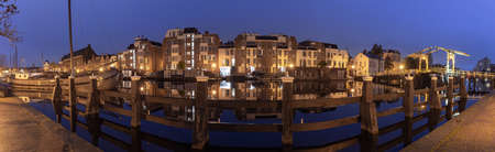 Panorama of the city embankment in Leiden at sunrise.の写真素材