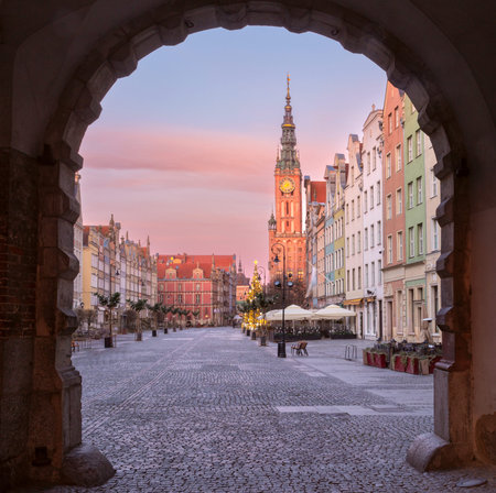 Gdansk. The old market square and the belfry of the town hall early in the morning.