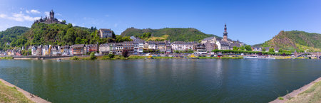 Traditional half-timbered houses on the banks of the Moselle River in Cochem.の写真素材