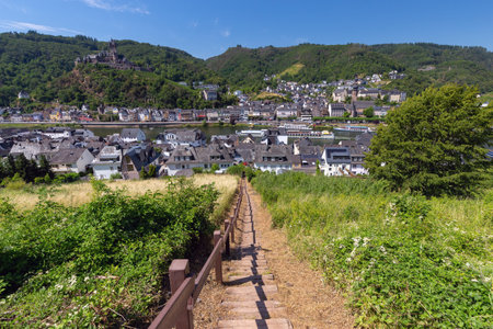 Traditional half-timbered houses on the banks of the Moselle River in Cochem.の写真素材