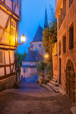 Marburg. Old medieval street in the historic center in the early morning. Kirche St. Johannesの写真素材