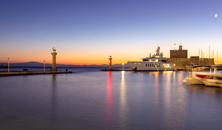 View of the city embankment in night lighting at dawn. Rhodes.の写真素材