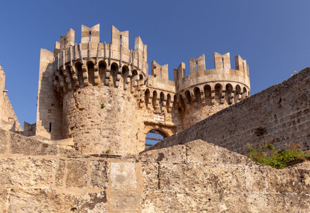 Stone towers and walls of old medieval fortifications on the Island of Rhodes.の写真素材