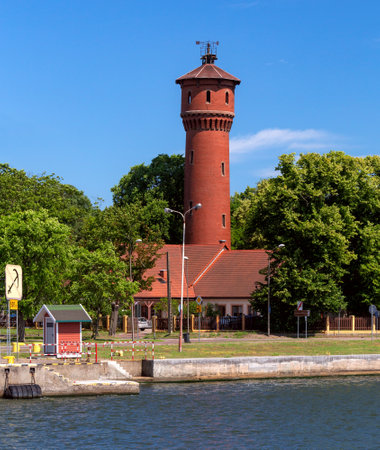 Swinoujscie. Old brick water tower on the bay embankment.の写真素材