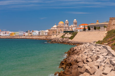 Cathedral of the Holy Cross on the waterfront of Cadiz on a sunny day.