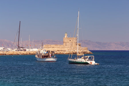 Ships in the port of Rhodes on a sunny day.