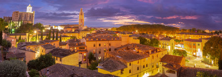 Panoramic view of the historical part of Girona at sunset.の写真素材