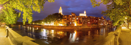 Panoramic View of Girona Riverside and Cathedral at Twilight, Catalonia, Spainの写真素材