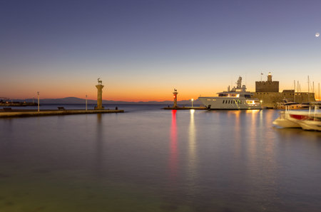Sunrise at the Mandraki Harbor in Rhodes, Greece