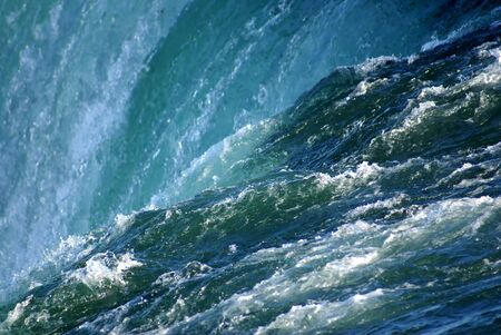 The very edge of powerful Niagara Falls.の写真素材