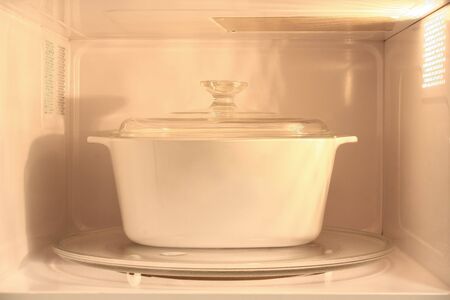 Cooking inside a modern microwave oven.の写真素材