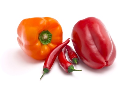 sweet and spicy peppers isolated on white backgroundの写真素材