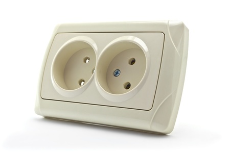 double socket and the cord with a plug on a white backgroundの写真素材