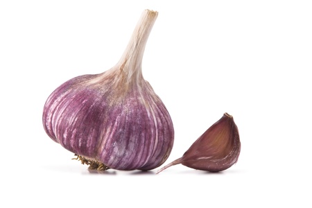 heads of garlic and garlic cloves on a white backgroundの写真素材