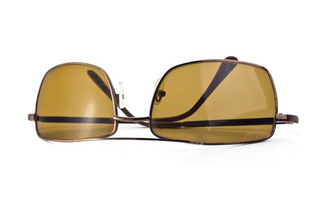brown sunglasses to protect from the sun, isolated on white backgroundの写真素材