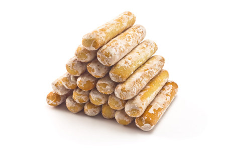 breadsticks in a sweet glaze on a white background