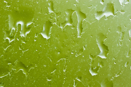 Drops of rain on a window glass during the rainの写真素材