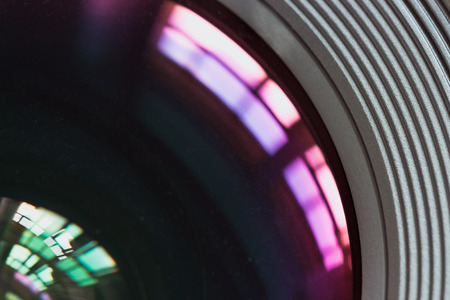 Objective lens with reflections of light sources closeupの写真素材