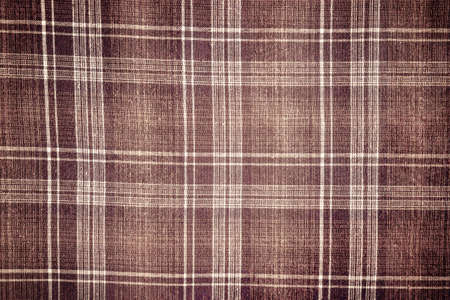 Texture of checkered fabric in brown over the entire plane of the frameの写真素材