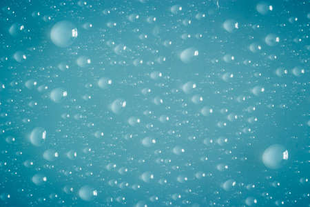 Background of many water droplets on a flat surfaceの写真素材