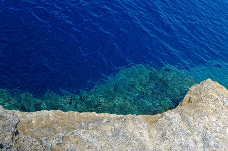 Blue water and the rock, island Gozo, Maltaの写真素材