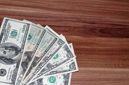 Dollar banknotes laid out in a cornerの写真素材