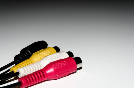 Video audio cable connectors on white background
