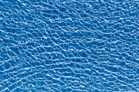 Blue rippled water in a swimming pool