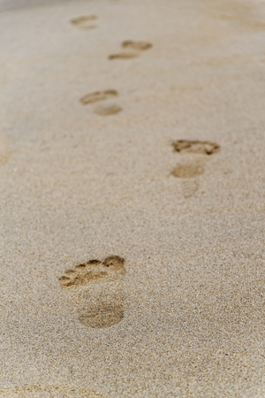 Beach scene of footprints in a sand. Da Nang, Vietnamの写真素材
