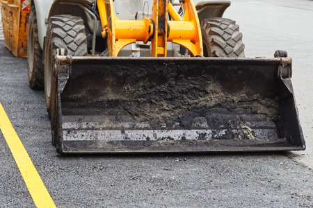 Close up of bulldozer scoop at road building. Muenster, Germany