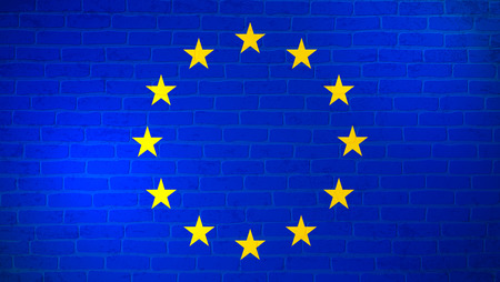 EUROPEAN UNION national flag painted on brick wall. Stone wall texture background. Vintage minimalistic template for wallpaper,poster, banner.Background for design in country flag.Vector illustration.のイラスト素材