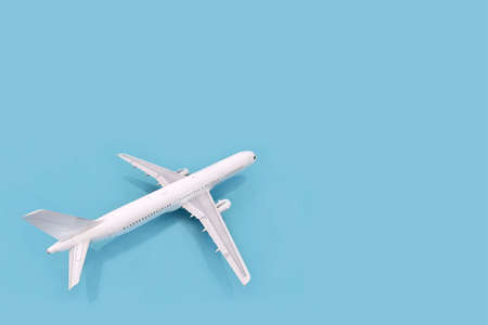 Three-dimensional model of a white plane on a blue background, 3d renderingの写真素材