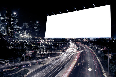 blank billboard at night time for advertisement city street night light , colored filter.の写真素材