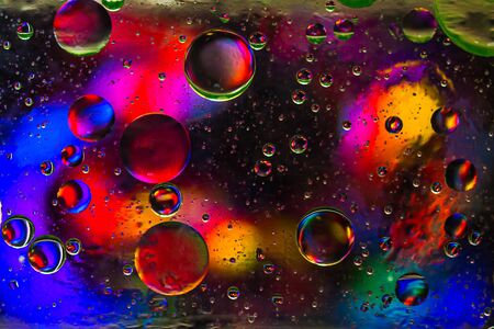 Colorful  pastel artistic image of oil drop on water for modern and creation design background.の写真素材