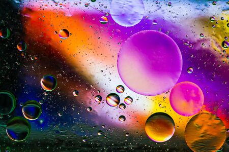Colorful  pastel artistic image of oil drop on water for modern and creation design background.の写真素材