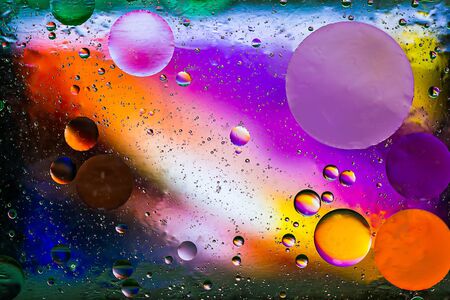 Colorful  pastel artistic image of oil drop on water for modern and creation design background.の写真素材