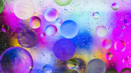 Colorful  pastel artistic image of oil drop on water for modern and creation design background.の写真素材