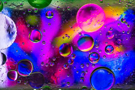 Colorful  pastel artistic image of oil drop on water for modern and creation design background.の写真素材