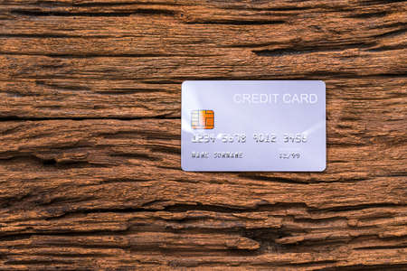 demo credit card on wooden background.の写真素材