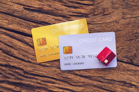 demo credit card on wooden background.