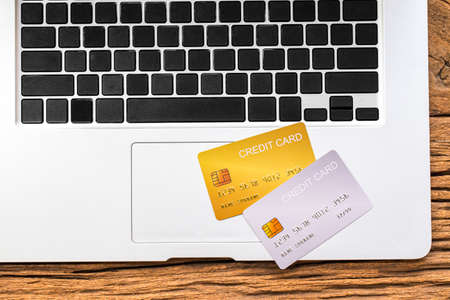 demo credit card payment online on  notebook or laptop backgroundの写真素材