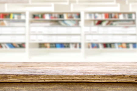 wooden table or mock up over blurred living room background.の写真素材